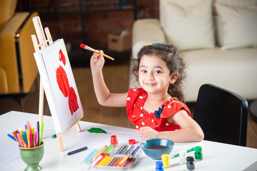 young girl painting